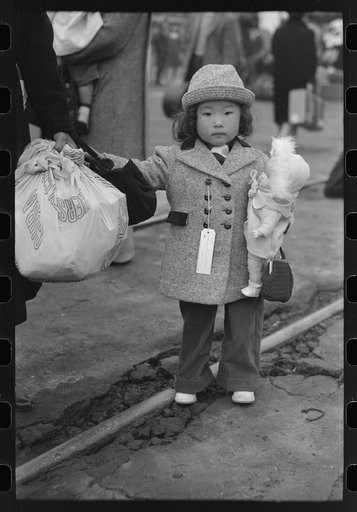 Los Angeles, California. Japanese-American evacuation from West Coast areas under U.S. Army war emergency order. Japanese-American child who will go with his parents to Owens Valley