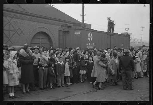 Los Angeles, California. Japanese-American evacuation from West Coast areas under U.S. Army war emergency order. Waiting for a train to take them to Owens Valley
