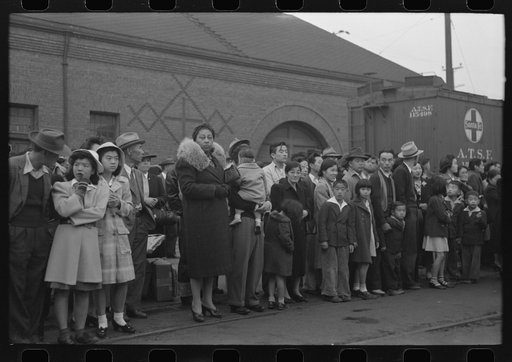 Los Angeles, California. Japanese-American evacuation from West Coast areas under U.S. Army war emergency order. Waiting for a train which will take them to Owens Valley