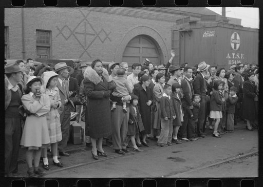 Los Angeles, California. Japanese-American evacuation from West Coast areas under U.S. Army war emergency order. Waiting for a train which will take them to Owens Valley