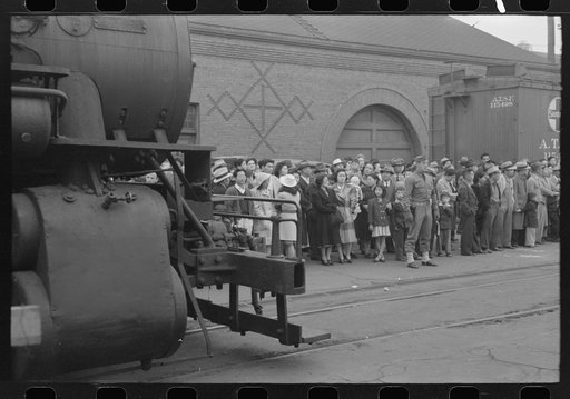Untitled photo, possibly related to: Los Angeles, California. The evacuation of Japanese-Americans from West Coast areas under U.S. Army war emergency order. Waiting for train to take them to Owens Valley