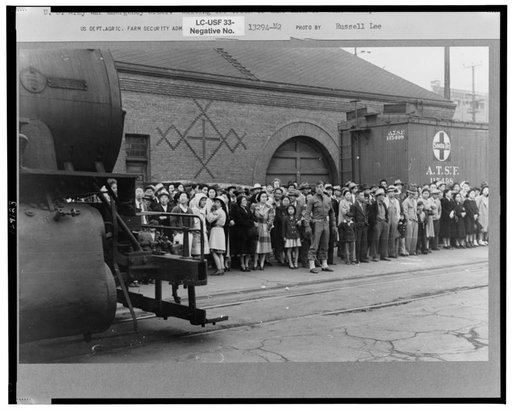 Los Angeles, California. The evacuation of Japanese-Americans from West Coast areas under U.S. Army war emergency order. Waiting for train to take them to Owens Valley