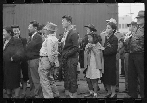 Los Angeles, California. The evacuation of Japanese-Americans from West Coast areas under U.S. Army war emergency order. Japanese-Americans watching train taking their friends and relatives to Owens Valley