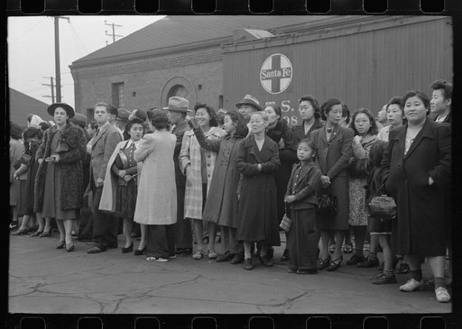 Los Angeles, California. The evacuation of Japanese-Americans from West Coast areas under U.S. Army war emergency order. Japanese-Americans watching train taking their friends and relatives to Owens Valley