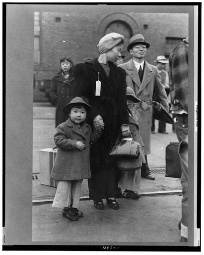 Los Angeles, California. The evacuation of Japanese-Americans from West Coast areas under U.S. Army war emergency order. Japanese-American family waiting for train to take them to Owens Valley