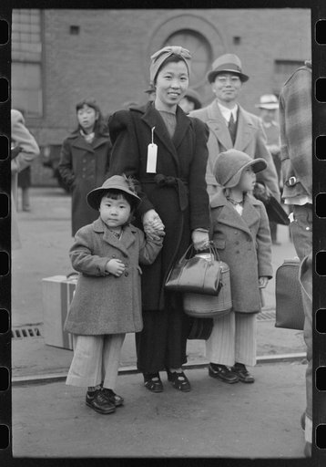 Los Angeles, California. The evacuation of Japanese-Americans from West Coast areas under U.S. Army war emergency order. Japanese-American family waiting for train to take them to Owens Valley
