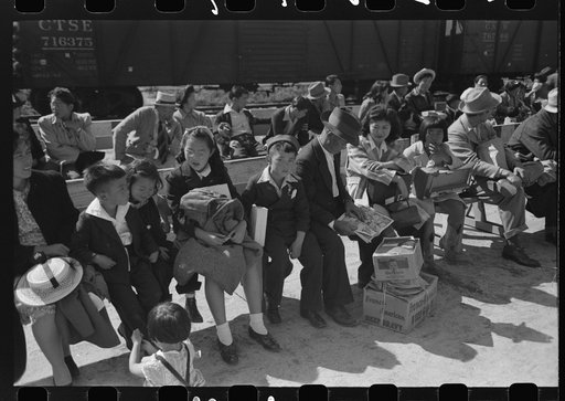 Santa Anita reception center, Los Angeles, California. The evacuation of Japanese and Japanese-Americans from West Coast areas under U.S. Army war emergency order. Waiting for registration