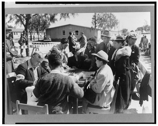 Santa Anita reception center, Los Angeles, California. The evacuation of Japanese and Japanese-Americans from West Coast areas under U.S. Army war emergency order. Registering Japanese-Americans