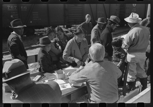 Santa Anita reception center, Los Angeles, California. The evacuation of Japanese and Japanese-Americans from West Coast areas under U.S. Army war emergency order. Registering Japanese-Americans upon arrival