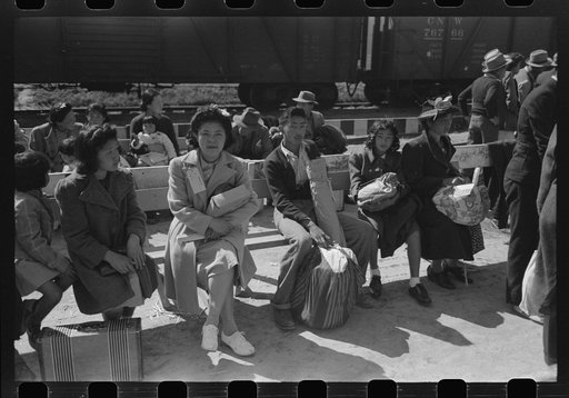 Santa Anita reception center, Los Angeles, California. The evacuation of Japanese and Japanese-Americans from West Coast areas under U.S. Army war emergency order. Japanese-Americans waiting to be registered