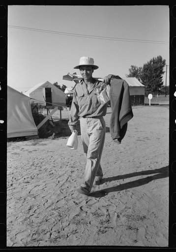 Nyssa, Oregon. FSA (Farm Security Administration) mobile camp. Japanese-Americans dumping garbage. A Japanese-American farm worker who lives at the camp