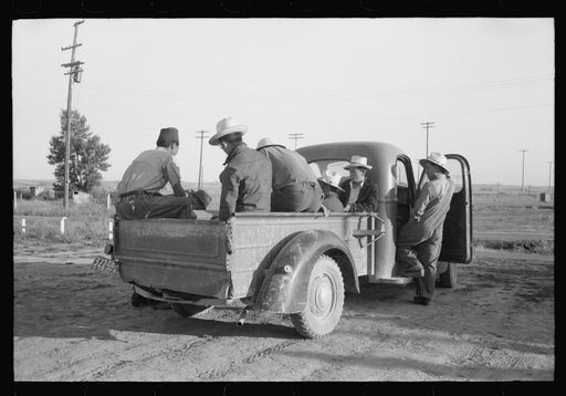 Untitled photo, possibly related to: Nyssa, Oregon. FSA (Farm Security Administration) mobile camp. Farmers send trucks to the camp to pick up the Japanese-American farm workers living there