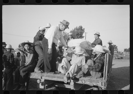 Nyssa, Oregon. FSA (Farm Security Administration) mobile camp. Japanese-American farm workers leaving the camp