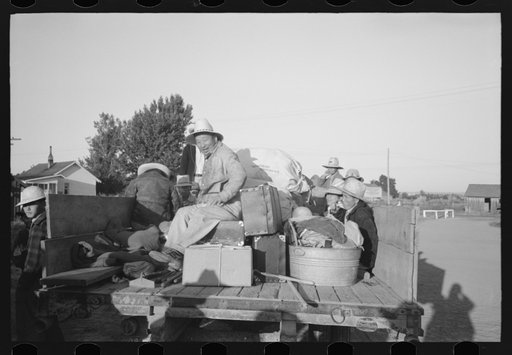 Nyssa, Oregon. FSA (Farm Security Administration) mobile camp. Japanese-American farm workers leaving the camp