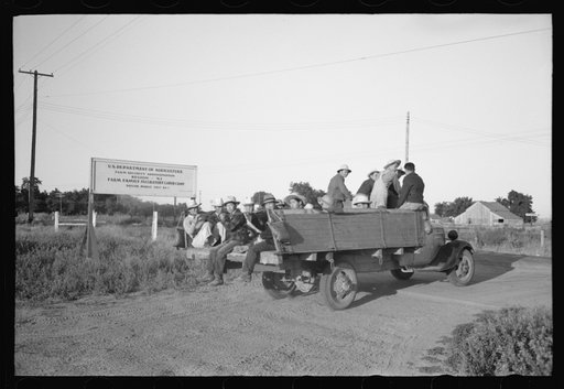 Nyssa, Oregon. FSA (Farm Security Administration) mobile camp. Japanese-American farm workers leaving the camp