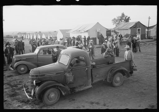 Nyssa, Oregon. FSA (Farm Security Administration) mobile camp. Japanese-American farm workers ready to leave for the fileds. The farmers send trucks to the camp to pick them up