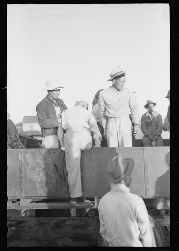 Nyssa, Oregon. FSA (Farm Security Administration) mobile camp. Japanese-American farm workers leaving the camp