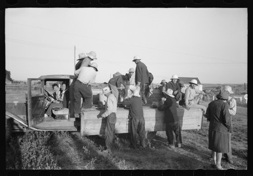 Nyssa, Oregon. FSA (Farm Security Administration) mobile camp. Japanese-Americans leaving the camp to work in the fields