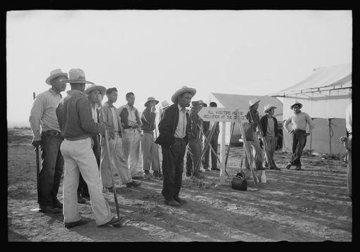 Nyssa, Oregon. FSA (Farm Security Administration) mobile camp. Japanese-American farm workers ready to leave for the fields. The farmers send trucks to the camp to pick them up