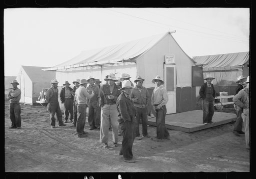 Untitled photo, possibly related to: Nyssa, Oregon. FSA (Farm Security Administration) mobile camp. Japanese-American farm workers ready to leave for the fields. The farmers send trucks to the camp to pick them up