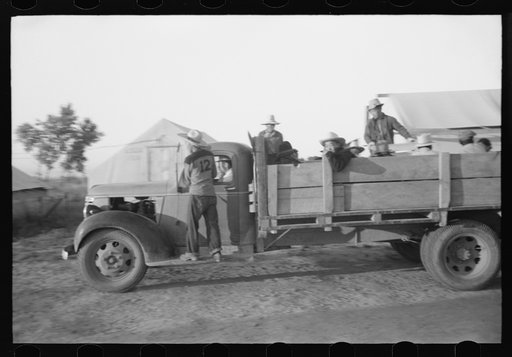 Untitled photo, possibly related to: Nyssa, Oregon. FSA (Farm Security Administration) mobile camp. Japanese-American farm workers leaving the camp