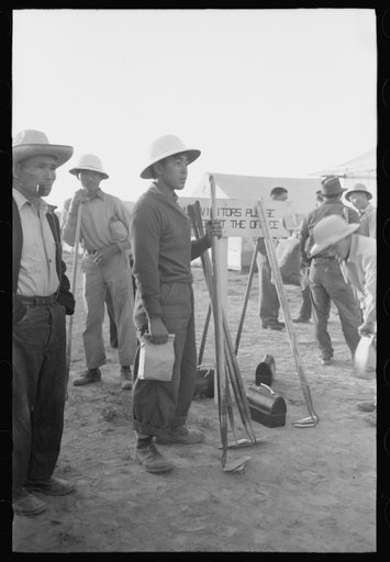 Nyssa, Oregon. FSA (Farm Security Administration) mobile camp. Japanese-American farm workers ready to leave for the fields. The farmers send trucks to the camp to pick them up