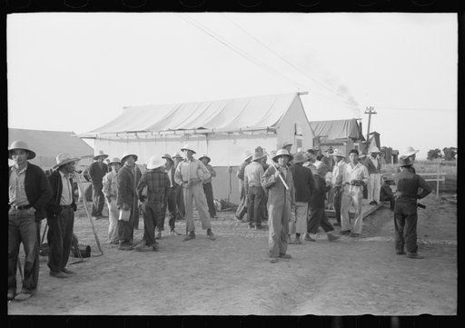 Untitled photo, possibly related to: Nyssa, Oregon. FSA (Farm Security Administration) mobile camp. Japanese-American farm workers ready to leave for the fields. The farmers send trucks to the camp to pick them up