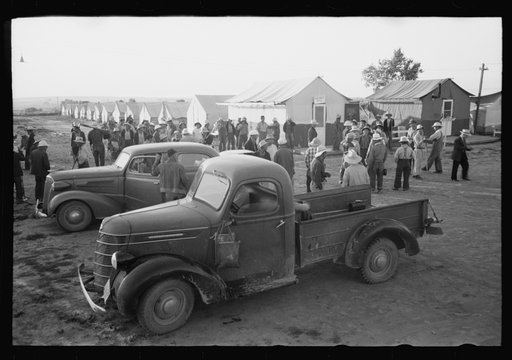 Untitled photo, possibly related to: Nyssa, Oregon. FSA (Farm Security Administration) mobile camp. Japanese-American farm workers ready to leave for the fields. The farmers send trucks to the camp to pick them up