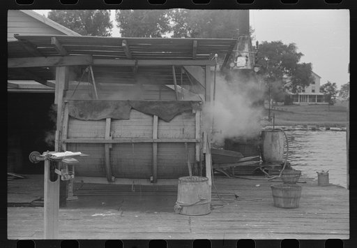 Untitled photo, possibly related to: Crab cooker which holds about seven barrels of crabs. The cooking process lasts for thirty minutes and is done by live steam from boiler in background. Rock Point, Maryland