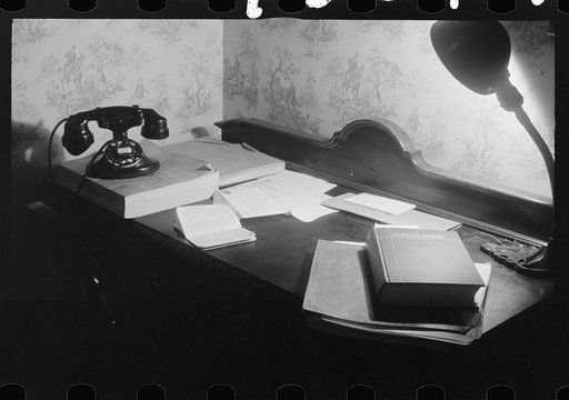 Washington, D.C. A government clerk's room, showing a desk with books, telephone and directory, and a desk lamp on it