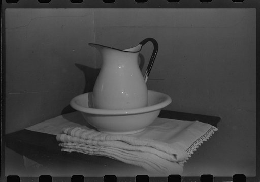 Pitcher and bowl in hotel room. Rolla, North Dakota