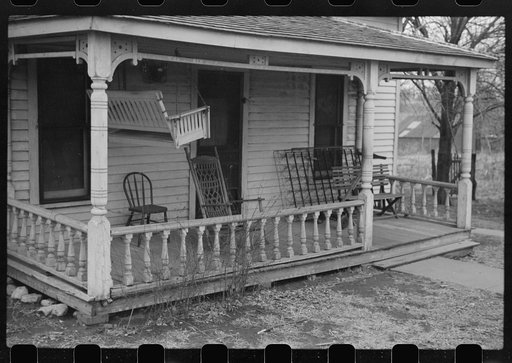 Untitled photo, possibly related to: Mayetta, Kansas. Porch swing up for the winter