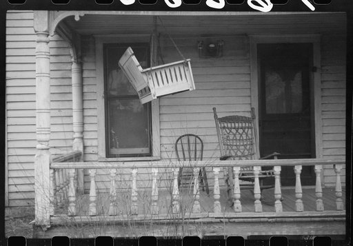 Mayetta, Kansas. Porch swing up for the winter