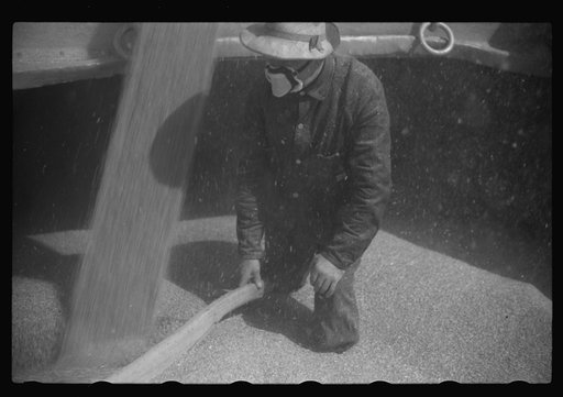 Untitled photo, possibly related to: Grain trimmer, Duluth, Minnesota