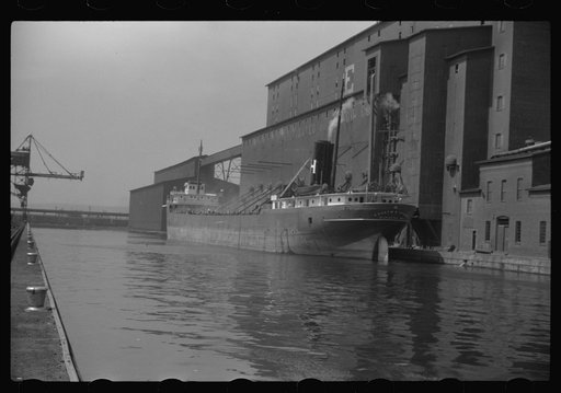 Untitled photo, possibly related to: Grain boat at elevator. Duluth, Minnesota