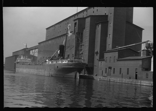 Untitled photo, possibly related to: Grain boat at elevator. Duluth, Minnesota