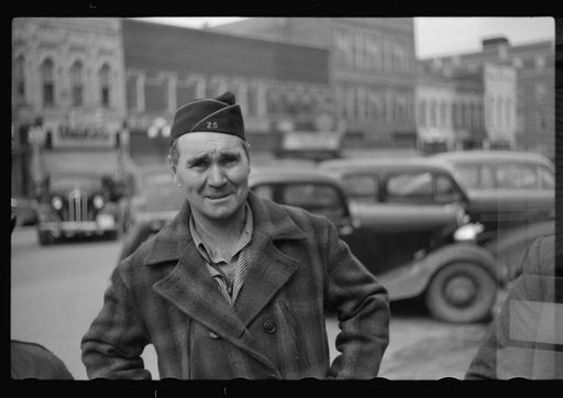 Untitled photo, possibly related to: At the American Legion booth for collecting scrap paper. Chillicothe, Missouri