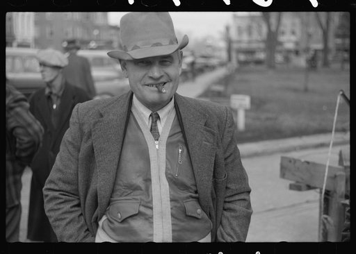 Untitled photo, possibly related to: At the American Legion booth for collecting scrap paper. Chillicothe, Missouri