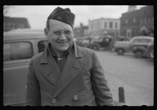 Untitled photo, possibly related to: At the American Legion booth for collecting scrap paper. Chillicothe, Missouri