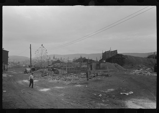 Mount Carmel,] Pennsylvania. Church spires and houses seen over coalyards on the outskirts of town