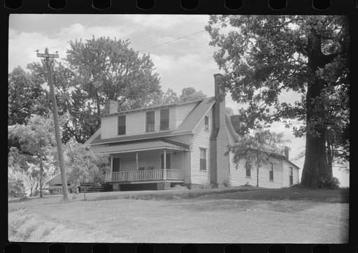 Company house on the main street of the mill town of Swepsonville, North Carolina