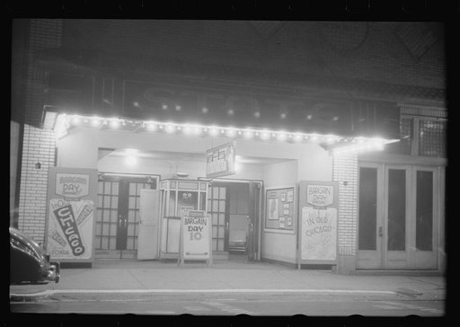 Untitled photo, possibly related to: A small movie house on the main street of Durham, North Carolina