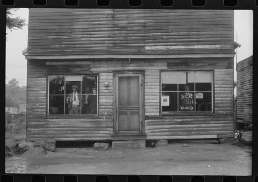 A combination pool room, barbershop, shoe shine parlor and general hangout for Negroes in Roxboro, North Carolina