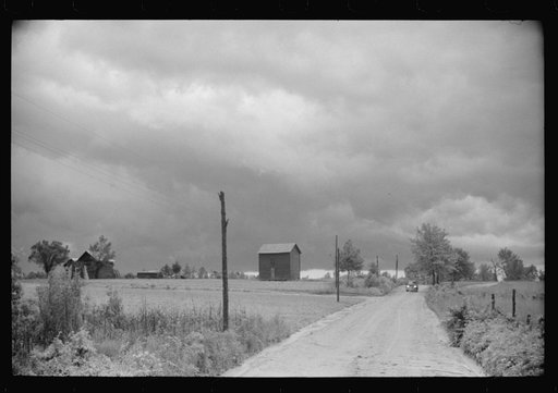 Storm brewing. A country road near Stem, North Carolina