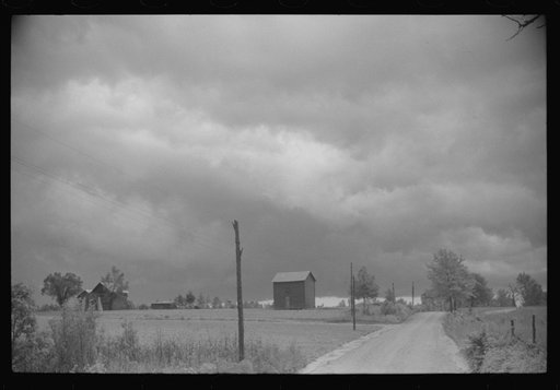 Untitled photo, possibly related to: Storm brewing. A country road near Stem, North Carolina
