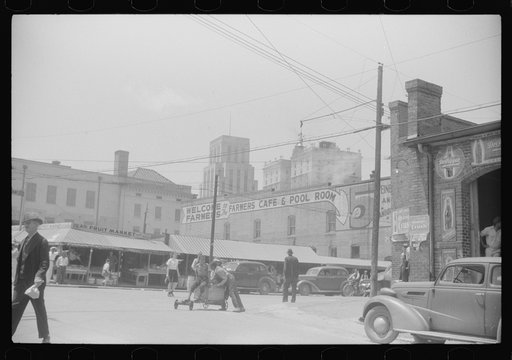 Untitled photo, possibly related to: [Outside of the tobacco warehouses in Durham, North Carolina