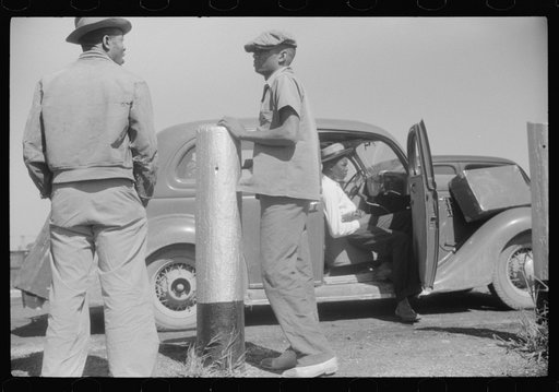 Migratory agricultural workers at the Little Creek end of the Norfolk-Cape Charles ferry. They are going to Bridgeville, Delaware to pick apples