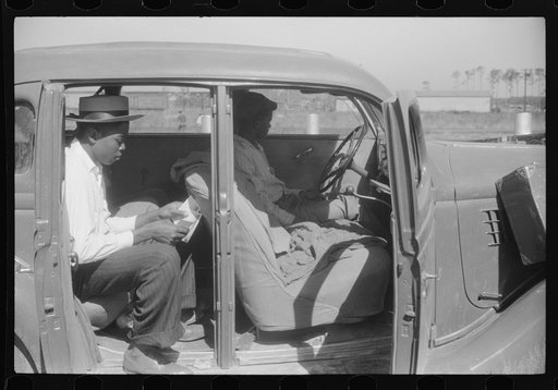 Migratory agricultural workers at the Little Creek end of the Norfolk-Cape Charles ferry. They are going to Bridgeville, Delaware to pick apples