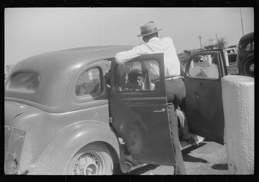 Untitled photo, possibly related to: Migratory agricultural workers at the Little Creek end of the Norfolk-Cape Charles ferry. They are going to Bridgeville, Delaware to pick apples