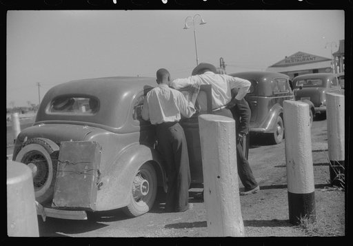 Untitled photo, possibly related to: Migratory agricultural workers at the Little Creek end of the Norfolk-Cape Charles ferry. They are going to Bridgeville, Delaware to pick apples